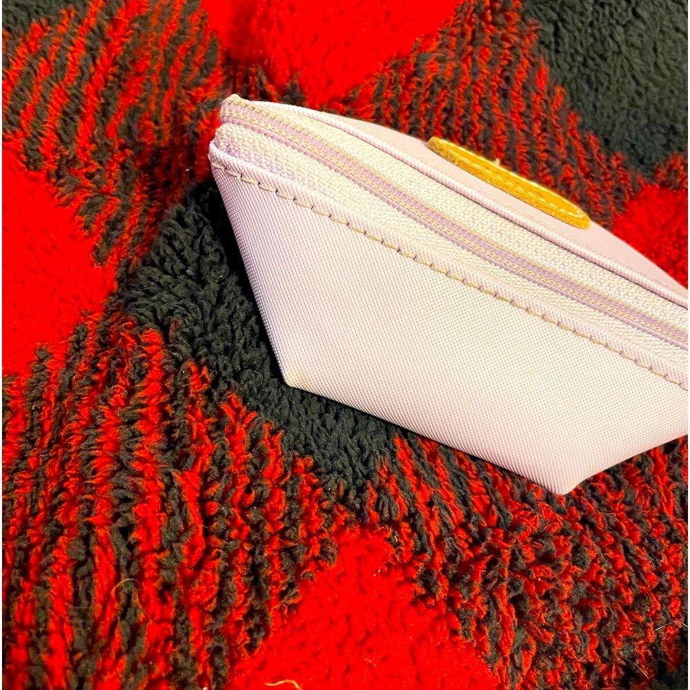 Jon Hart Pod Pouch. Color purple, initials kmf